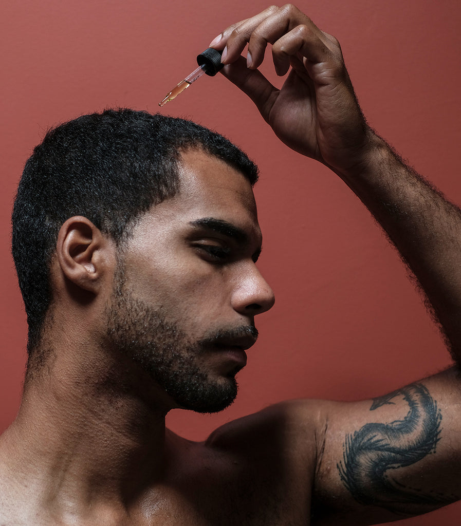 photo of model applying the serum form curativo apothecary by badami and co