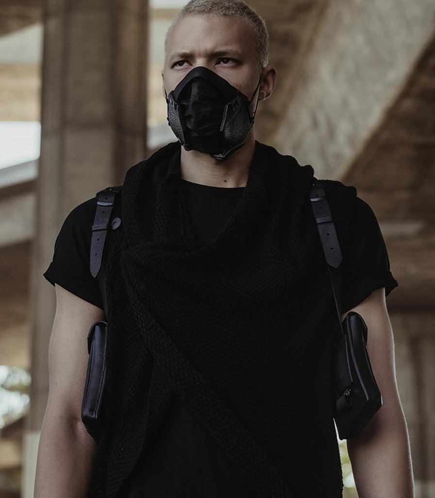 On model all black leather double holster harness from badami and co