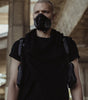 On model all black leather double holster harness from badami and co