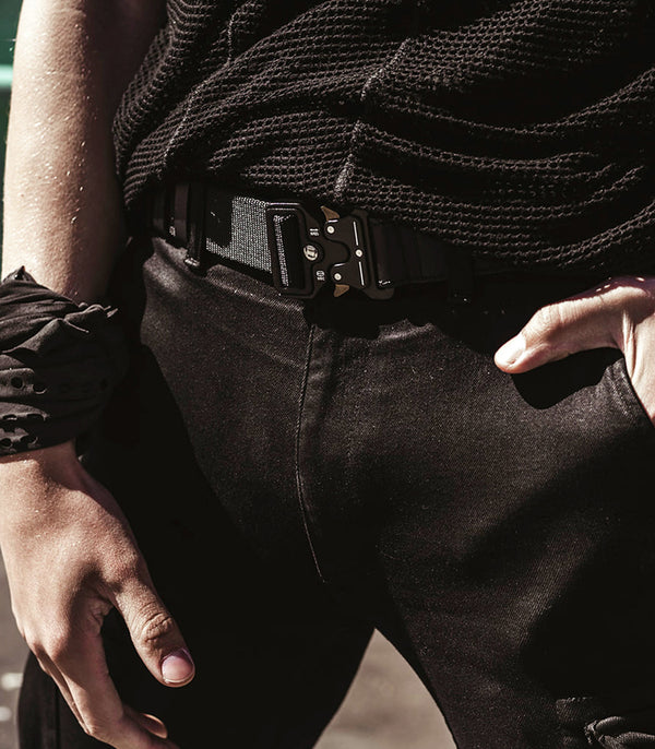 Model wearing Adjustable jet buckle belt made from nylon and genuine leather from badami and co